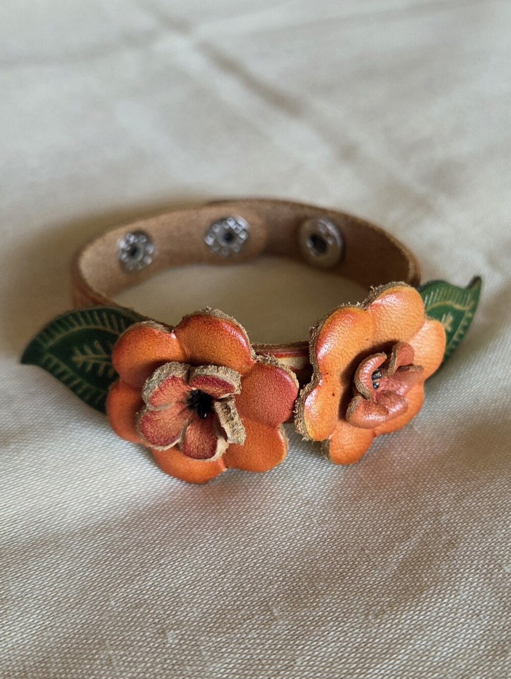 NWOT Handmade leather flower bracelet orange with green leaves boho cottage
